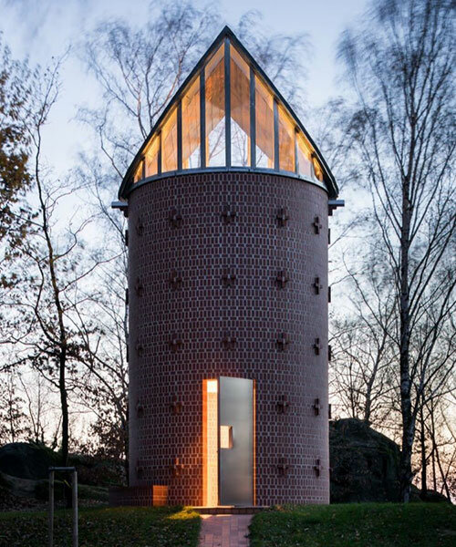 atypical gable roof replaces dome frescoes in czech brick-covered chapel