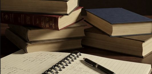 Graphic of books and pen created using Google Gemini AI