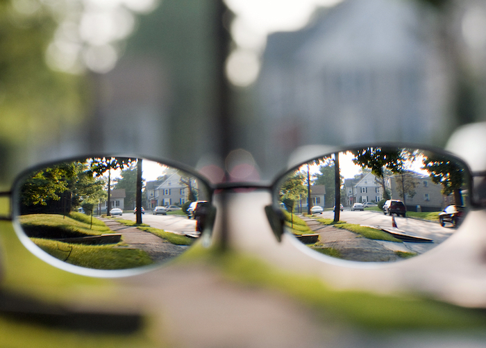 Image of glasses clarifying blurred visioin by Cathy released via Creative Commons BY-NC 2.0