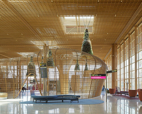 fluid rattan interiors take over SOM-designed kempegowda airport in india