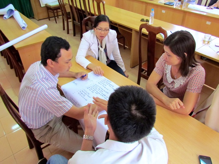 Image of Vietnamese journalists by David Brewer released via Creative Commons
