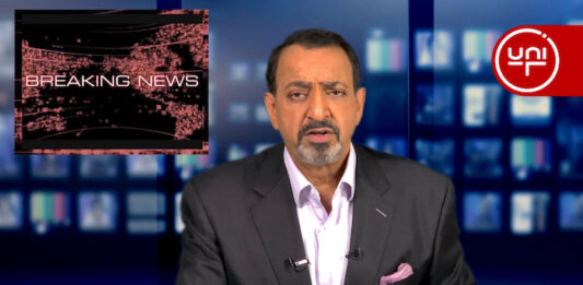 Riz Khan presenting