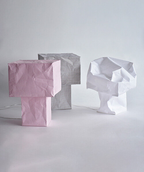 vacuum-sealed flat pack blooms into tsubomi paper lamp by kazuhiro yamanaka