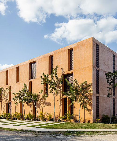 chukum, stone, and rhythmic openings shape mexican housing complex by P11 arquitectos